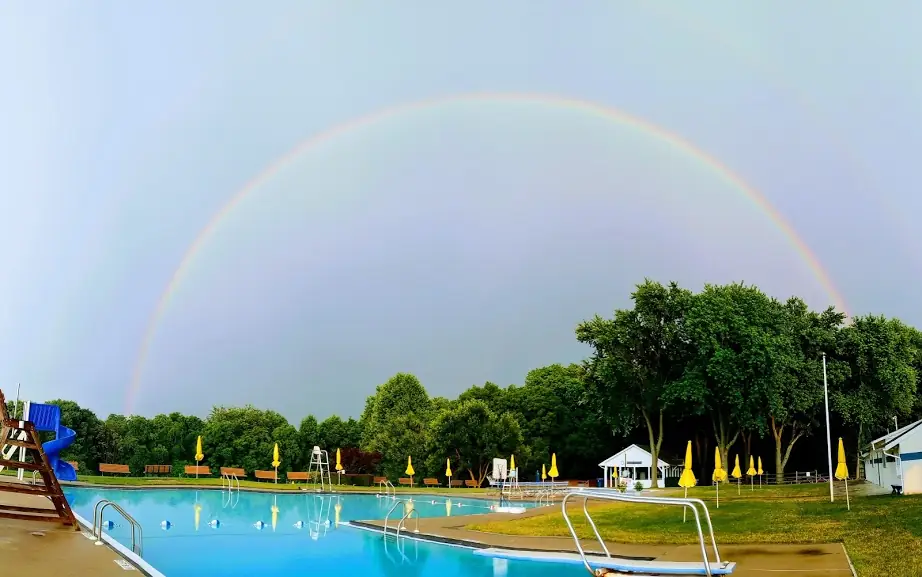 A rainbow over the Wedgewood pool and grounds